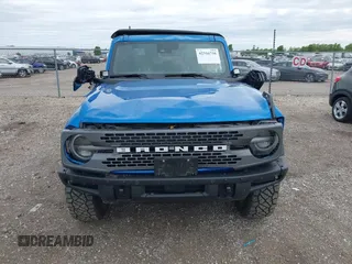 2021 Ford Bronco z VIN 1FMEE5DHXMLA78970, wystawiony jako IAAI lot #42316756 z przebiegiem 35 668 mil mil oraz . Historia ofert i sprzedaży dostępna na DreamBid. Obrazek 6.