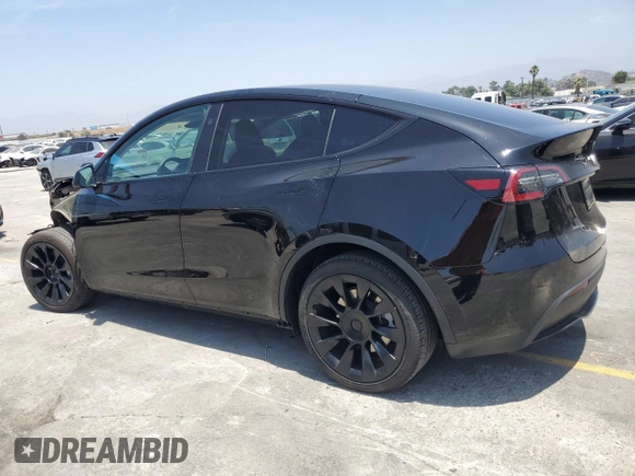 2024 Tesla Model Y Long Range with VIN 7SAYGDEEXRA253111, listed as a Copart auction lot 60929295 with 16,423 mi miles and Salvage title. Bid and sale history available at DreamBid. Image 2.