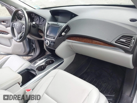 2020 Acura MDX with VIN 5J8YD4H39LL003853, listed as a IAAI auction lot 42731495 with 112,975 mi miles and . Bid and sale history available at DreamBid. Image 5.