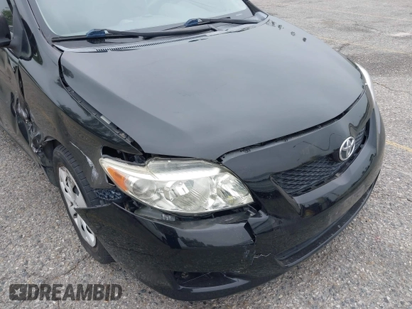 2010 Toyota Corolla with VIN 1NXBU4EE1AZ285449, listed as a IAAI auction lot 42040668 with 121,404 mi miles and . Bid and sale history available at carsss.com. Image 17.