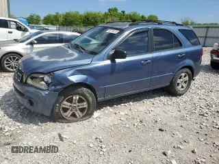 2005 Kia Sorento LX z VIN KNDJC733655453902, wystawiony jako Copart lot #56118415 z przebiegiem Nie podano mil oraz Szkoda całkowita • Salvage title. Historia ofert i sprzedaży dostępna na DreamBid. Obrazek 1.