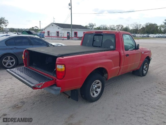 2002 Mazda B-Series 2WD Truck SX with VIN 4F4YR12D62TM23429, listed as a IAAI auction lot 41646076 with 97,360 mi miles. Bid and sale history available at carsss.com. Image 4.