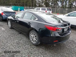 2016 Mazda Mazda6 i Sport with VIN JM1GJ1U58G1405227, listed as a IAAI auction lot 41798350 with 118,151 mi miles. Bid and sale history available at carsss.com. Image 3.
