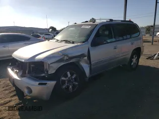 2004 GMC Envoy SLE z VIN 1GKDS13S842182799, wystawiony jako Copart lot #55553774 z przebiegiem 216 710 mil mil oraz Szkoda całkowita • Salvage title. Historia ofert i sprzedaży dostępna na DreamBid. Obrazek 1.