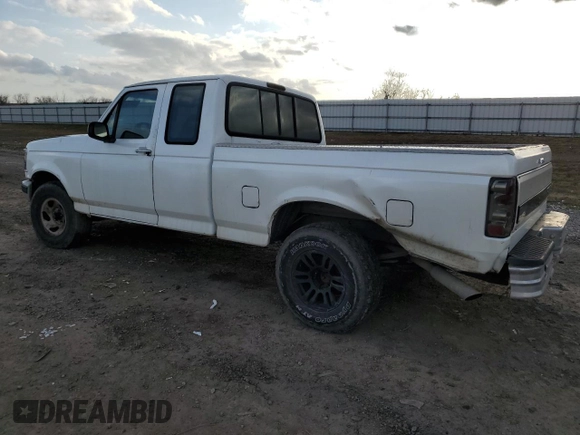 1994 Ford F-150 with VIN 1FTEX15N3RKA58651, listed as a Copart auction lot 43590145 with 203,489 mi miles and Salvage Title. Bid and sale history available at carsss.com. Image 2.