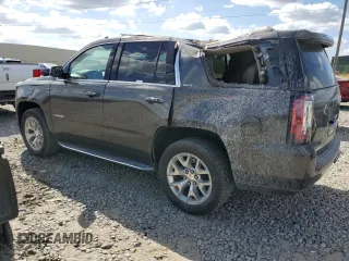 2020 GMC Yukon SLT with VIN 1GKS1BKC3LR238700, listed as a Copart auction lot 74897254 with 82,806 mi miles and Salvage Title. Bid and sale history available at DreamBid. Image 2.
