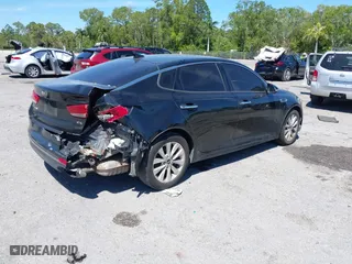 2017 Kia Optima EX with VIN 5XXGU4L35HG142807, listed as a IAAI auction lot 41856251 with 104,634 mi miles. Bid and sale history available at carsss.com. Image 4.