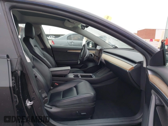 2022 Tesla Model 3 with VIN 5YJ3E1EA0NF191336, listed as a IAAI auction lot 41600441 with 126,671 mi miles and . Bid and sale history available at DreamBid. Image 5.