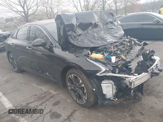 2024 Kia K5 GT-Line z VIN 5XXG64J22RG257080, wystawiony jako IAAI lot #42026127 z przebiegiem 19 477 mil mil oraz . Historia ofert i sprzedaży dostępna na DreamBid. Obrazek 1.