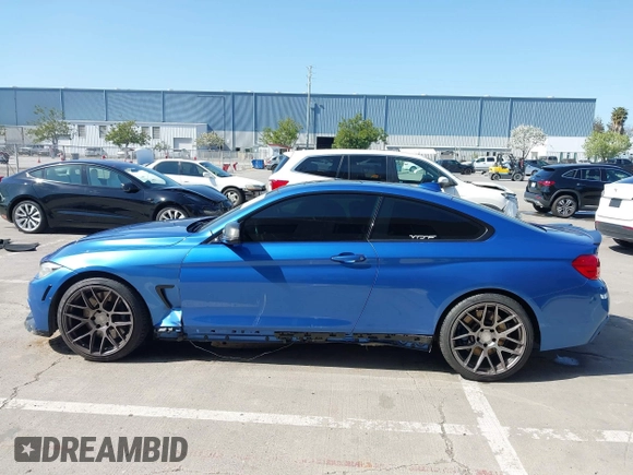 2015 BMW 4 Series 435i with VIN WBA3R1C50FF774588, listed as a IAAI auction lot 42001394 with 96,400 mi miles and . Bid and sale history available at carsss.com. Image 15.