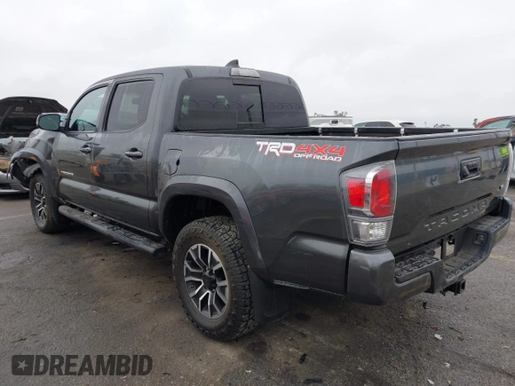 2020 Toyota Tacoma SR5 z VIN 3TMCZ5AN6LM323920, wystawiony jako IAAI lot #41885427 z przebiegiem 153 952 mil mil oraz . Historia ofert i sprzedaży dostępna na DreamBid. Obrazek 3.