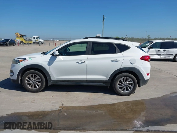 2017 Hyundai Tucson SE with VIN KM8J23A45HU343355, listed as a IAAI auction lot 41864766 with 115,931 mi miles and . Bid and sale history available at DreamBid. Image 14.