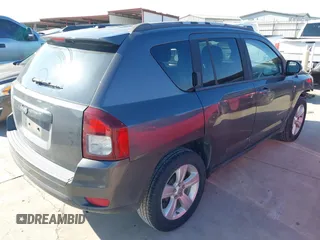 2015 Jeep Compass Sport with VIN 1C4NJCBBXFD274472, listed as a IAAI auction lot 41629585 with 124,407 mi miles. Bid and sale history available at carsss.com. Image 4.