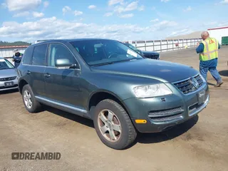 2004 Volkswagen Touareg with VIN WVGEM77L54D061132, listed as a IAAI auction lot 42127905 with 146,801 mi miles and . Bid and sale history available at DreamBid. Image 1.