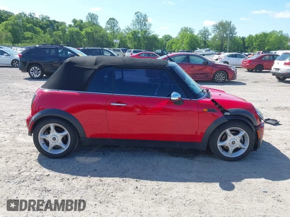 2005 MINI Convertible with VIN WMWRF33445TF62043, listed as a IAAI auction lot 42279363 with 173,067 mi miles and . Bid and sale history available at DreamBid. Image 13.