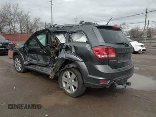 2014 Dodge Journey R/T z VIN 3C4PDDFG8ET127250, wystawiony jako IAAI lot #41920461 z przebiegiem Nie podano mil oraz . Historia ofert i sprzedaży dostępna na DreamBid. Obrazek 3.