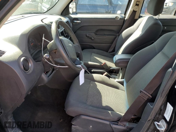 2010 Jeep Patriot Sport with VIN 1J4NF2GB9AD518345, listed as a Copart auction lot 52528755 with 175,193 mi miles and Salvage Title. Bid and sale history available at carsss.com. Image 7.