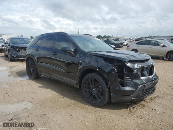 2019 Cadillac XT4 FWD Sport with VIN 1GYFZER43KF171712, listed as a Copart auction lot 54553605 with 81,158 mi miles and Salvage Title. Bid and sale history available at carsss.com. Image 4.