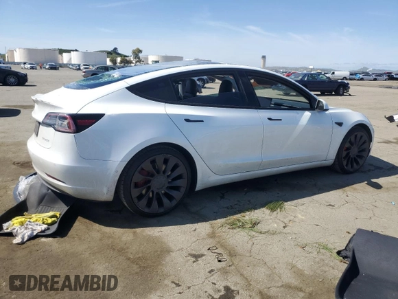 2021 Tesla Model 3 Performance with VIN 5YJ3E1ECXMF091342, listed as a Copart auction lot 49987595 with 120,881 mi miles and Salvage Title. Bid and sale history available at DreamBid. Image 3.
