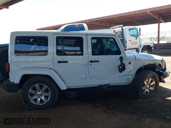 2016 Jeep Wrangler Unlimited Sahara with VIN 1C4BJWEG0GL126270, listed as a IAAI auction lot 42229364 with 50,847 mi miles and . Bid and sale history available at DreamBid. Image 13.