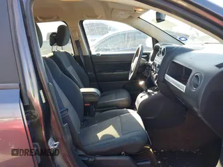 2015 Jeep Compass Sport with VIN 1C4NJCBBXFD274472, listed as a IAAI auction lot 41629585 with 124,407 mi miles. Bid and sale history available at carsss.com. Image 5.