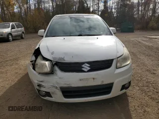 2009 Suzuki SX4 with VIN JS2YA411895100156, listed as a Copart auction lot 77779704 with 235,846 mi miles and Salvage Title. Bid and sale history available at carsss.com. Image 4.