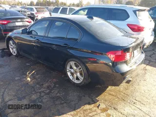 2014 BMW 3 Series 335i with VIN WBA3A9G55ENS64791, listed as a IAAI auction lot 40997669 with 65,335 mi miles. Bid and sale history available at carsss.com. Image 3.