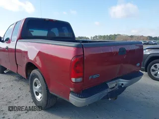 2000 Ford F-150 XL with VIN 1FTZX1729YNC32076, listed as a IAAI auction lot 41523364 with 216,726 mi miles. Bid and sale history available at carsss.com. Image 6.