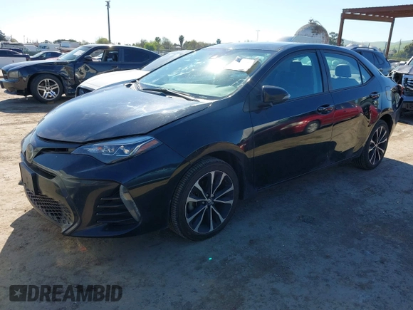 2019 Toyota Corolla L z VIN 5YFBURHE7KP857880, wystawiony jako IAAI lot #41850987 z przebiegiem 117 823 mil mil oraz . Historia ofert i sprzedaży dostępna na DreamBid. Obrazek 2.