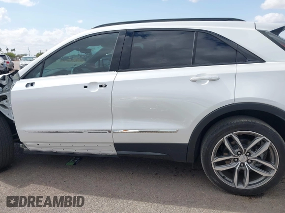 2022 Cadillac XT4 FWD Sport with VIN 1GYFZER44NF164899, listed as a IAAI auction lot 42152554 with 8,058 mi miles and . Bid and sale history available at DreamBid. Image 15.