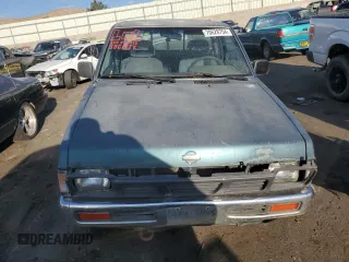 1993 Nissan Frontier SE z VIN 1N6HD16Y9PC398809, wystawiony jako Copart lot #70628754 z przebiegiem 224 511 mil mil oraz Szkoda całkowita • Salvage title. Historia ofert i sprzedaży dostępna na DreamBid. Obrazek 5.
