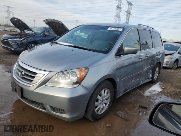 2010 Honda Odyssey EX-L with VIN 5FNRL3H69AB001952, listed as a Copart auction lot 49738155 with 95,721 mi miles and Salvage Title. Bid and sale history available at carsss.com. Image 1.