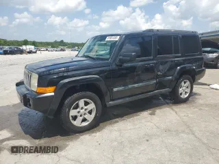 2008 Jeep Commander Sport z VIN 1J8HH48K58C126172, wystawiony jako Copart lot #61961285 z przebiegiem 235 022 mil mil oraz Szkoda całkowita • Salvage title. Historia ofert i sprzedaży dostępna na DreamBid. Obrazek 1.