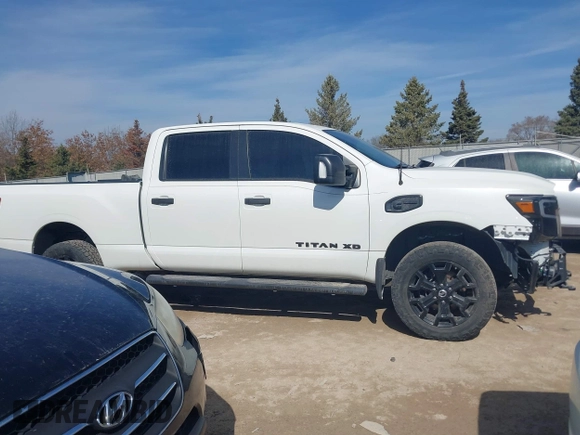 2018 Nissan Titan XD SV with VIN 1N6BA1F40JN523851, listed as a IAAI auction lot 41800730 with 104,527 mi miles. Bid and sale history available at carsss.com. Image 13.