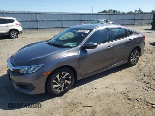 2017 Honda Civic EX z VIN 2HGFC2F70HH566637, wystawiony jako Copart lot #50250215 z przebiegiem 65 054 mil mil oraz Szkody całkowita. Historia ofert i sprzedaży dostępna na DreamBid. Obrazek 1.