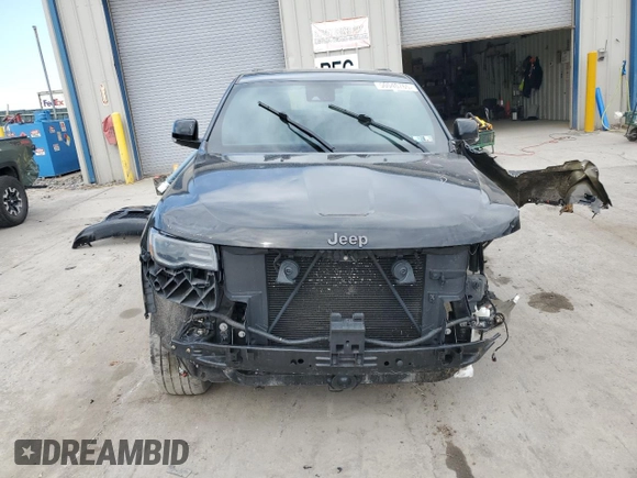 2021 Jeep Grand Cherokee Overland with VIN 1C4RJFCG3MC527325, listed as a Copart auction lot 50040765 with 64,338 mi miles and Salvage Title. Bid and sale history available at carsss.com. Image 5.