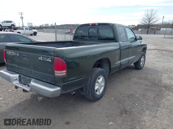 1997 Dodge Dakota with VIN 1B7GG23X1VS211394, listed as a IAAI auction lot 41723088 with 124,104 mi miles. Bid and sale history available at carsss.com. Image 4.