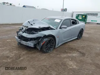 2020 Dodge Charger Scat Pack Widebody z VIN 2C3CDXGJ8LH216563, wystawiony jako IAAI lot #41502637 z przebiegiem Nie podano mil oraz . Historia ofert i sprzedaży dostępna na DreamBid. Obrazek 18.