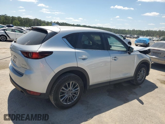 2020 Mazda CX-5 Touring z VIN JM3KFBCM2L1824072, wystawiony jako Copart lot #54825295 z przebiegiem 99 420 mil mil oraz Szkoda całkowita • Salvage title. Historia ofert i sprzedaży dostępna na DreamBid. Obrazek 3.