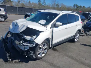 2015 Ford Escape Titanium with VIN 1FMCU0J94FUA69088, listed as a IAAI auction lot 41810406 with 167,749 mi miles. Bid and sale history available at carsss.com. Image 17.