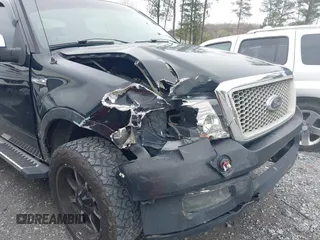 2005 Ford F-150 XLT with VIN 1FTPW14505FA88819, listed as a IAAI auction lot 41853524 with 227,414 mi miles. Bid and sale history available at carsss.com. Image 6.