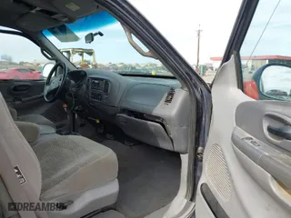2000 Ford F-150 XL with VIN 1FTRX18L2YKA10388, listed as a IAAI auction lot 41526430 with 144,480 mi miles. Bid and sale history available at carsss.com. Image 5.