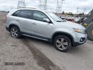 2012 Kia Sorento EX with VIN 5XYKU4A2XCG256830, listed as a IAAI auction lot 42031102 with 200,957 mi miles. Bid and sale history available at carsss.com. Image 1.