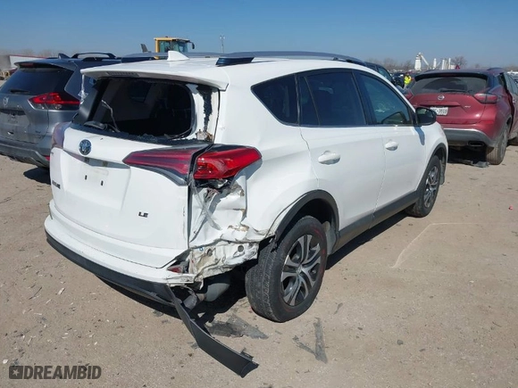 2016 Toyota RAV4 LE with VIN JTMZFREV7GJ096390, listed as a IAAI auction lot 41599268 with 94,568 mi miles. Bid and sale history available at carsss.com. Image 4.