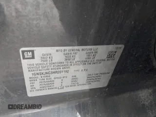 2017 Chevrolet Suburban Premier with VIN 1GNSKJKC3HR201180, listed as a IAAI auction lot 41516652 with Not Provided miles and . Bid and sale history available at DreamBid. Image 9.