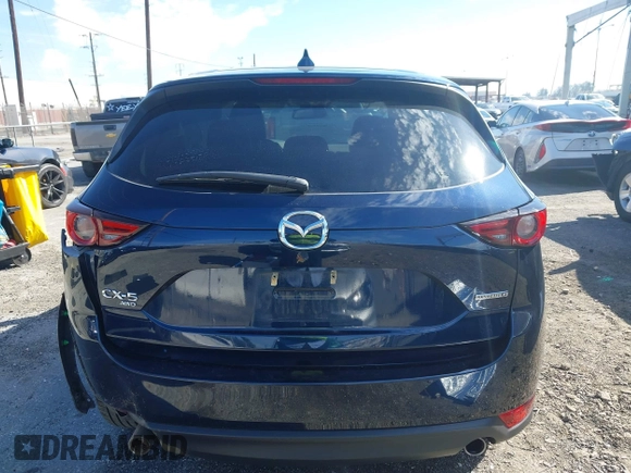 2020 Mazda CX-5 Grand Touring with VIN JM3KFBDM8L0807555, listed as a IAAI auction lot 41612906 with 40,518 mi miles. Bid and sale history available at carsss.com. Image 16.