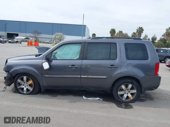 2015 Honda Pilot Touring with VIN 5FNYF3H91FB011847, listed as a IAAI auction lot 41841293 with 99,431 mi miles. Bid and sale history available at carsss.com. Image 15.