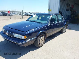 1996 Oldsmobile Cutlass Ciera 1SA VX5 z VIN 1G3AJ55M6T6397371, wystawiony jako IAAI lot #42222459 z przebiegiem 92 232 mil mil oraz . Historia ofert i sprzedaży dostępna na DreamBid. Obrazek 2.