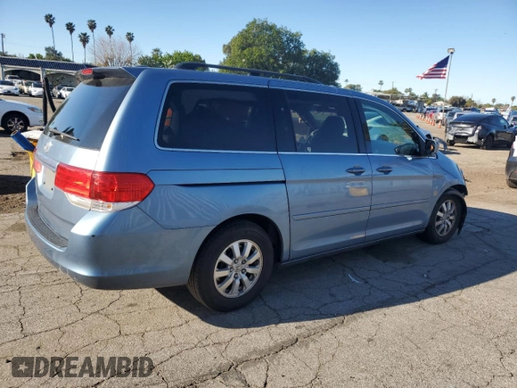 2010 Honda Odyssey EX-L with VIN 5FNRL3H61AB040518, listed as a Copart auction lot 49537765 with 182,735 mi miles and Salvage Title. Bid and sale history available at carsss.com. Image 3.
