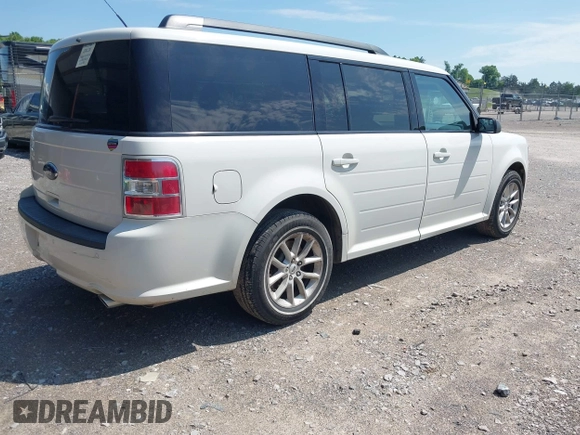 2013 Ford Flex SE with VIN 2FMGK5B8XDBD18085, listed as a IAAI auction lot 42139137 with 157,088 mi miles. Bid and sale history available at carsss.com. Image 4.
